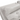 Close-up of a light gray leather sectional sofa headrest with plush, tufted design for added comfort.