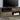 large casual tv stand with tv on it 