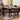 7 piece brown counter height set in a dining room