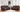 A full view of the Rosewood leather power reclining sofa set in a modern living room with a light-colored rug, showcasing the plush two-tone brown leather upholstery and reclining features.