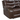 Close-up view of a brown leather reclining chair with nailhead trim and plush cushioning.