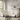 White modern sectional sofa with power reclining, LED ambient lighting, and smart storage, set in a cozy living room with elegant decor.